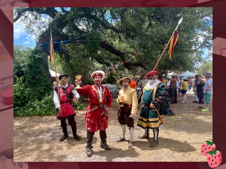 4 people are dressed as renaissance actors are outside in celebration.