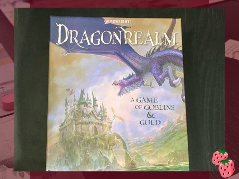 A game box with the words DragonRealm written at the top. A purple dragon flies towards a castle above the sea. The works A Game of Goblins and Gold are written in the right center of the box top.
