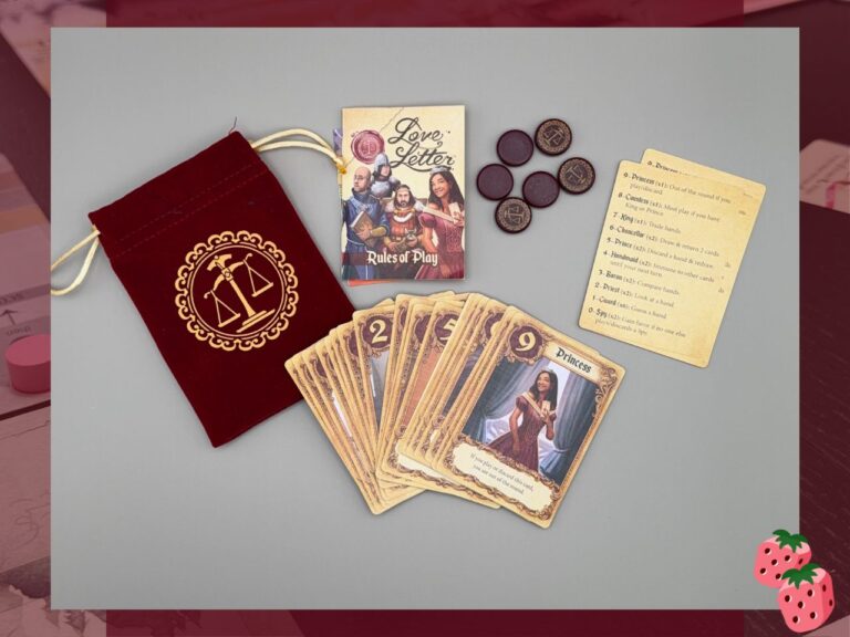 berry plays games featured love letter, showing a red drawstring pouch open, with all of the game cards on display next to the bag.