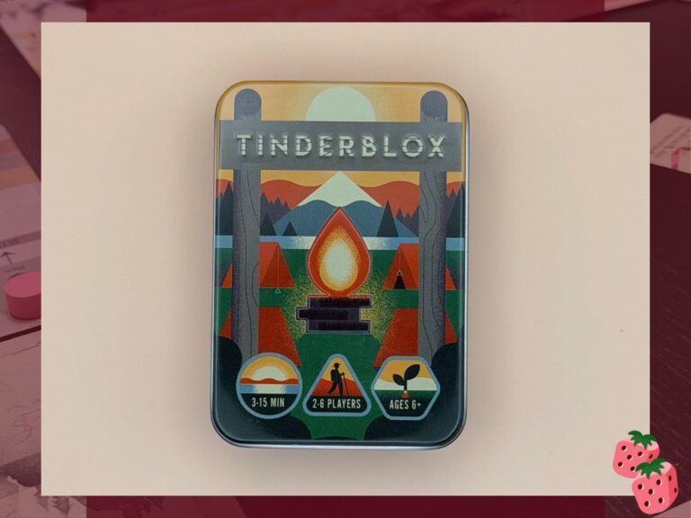 A small tin reading Tinderbox is shown. Pictured on the tin is a campfire in a campground. Icons show 3-15 minutes, 2-6 players and ages 6+.