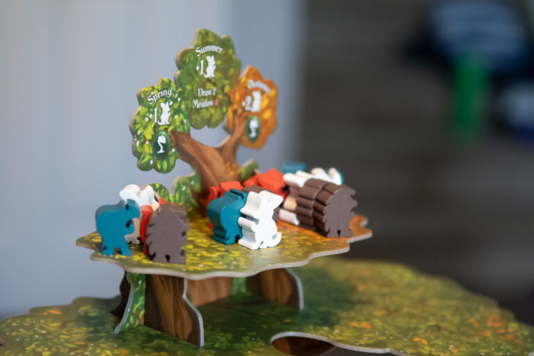Critter meeples on the top of the Ever Tree.