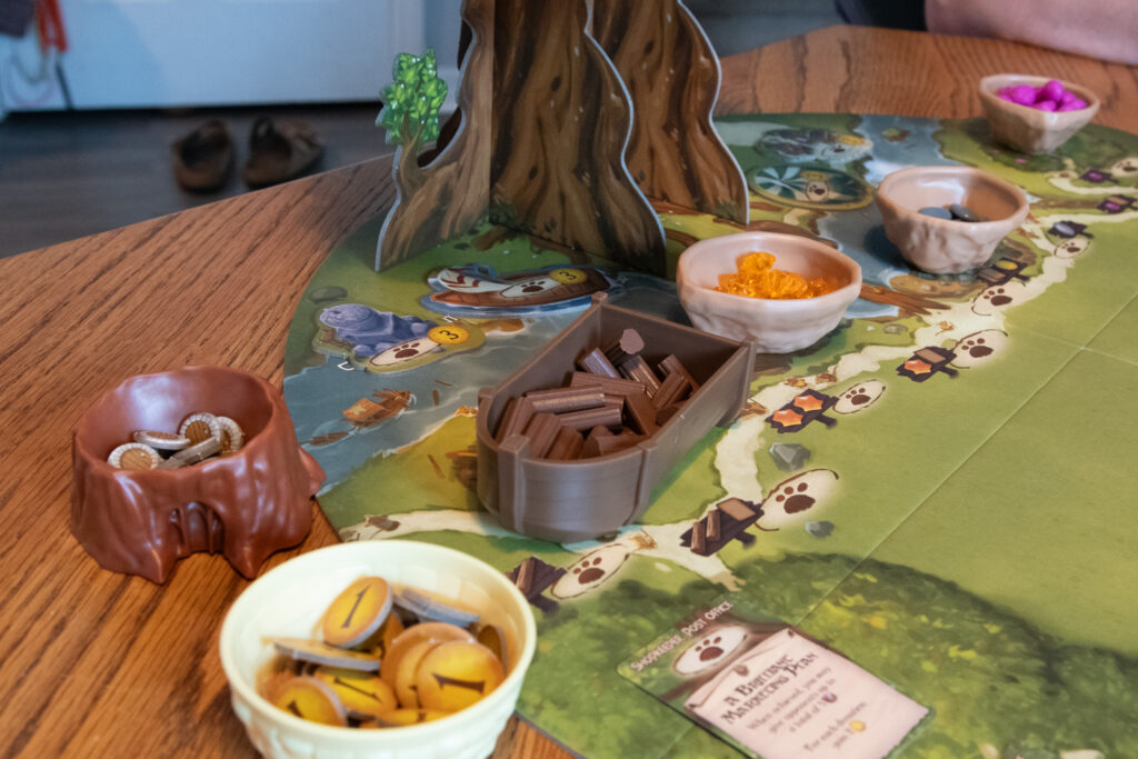 Everdell game resources at the bottom of the Ever Tree.