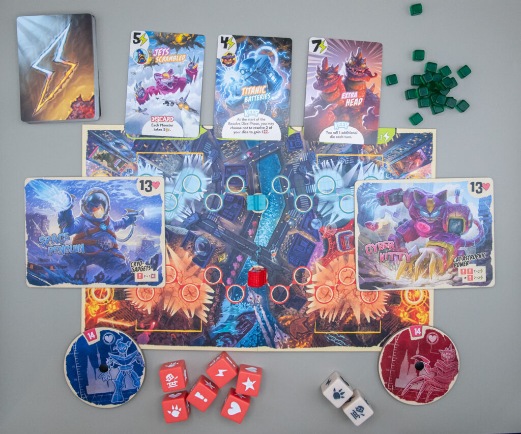 Game play is set up for Kind of Tokyo Duel featuring all components of the game.